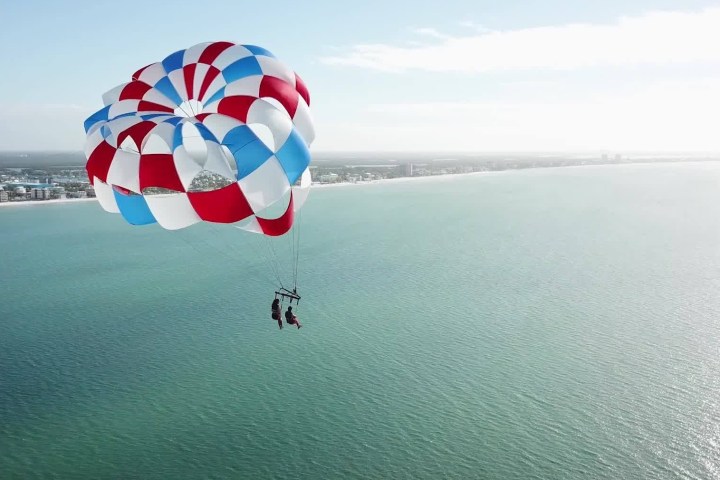 Parasailing in a body of water